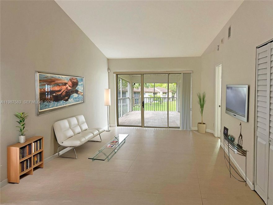 Corner unit with serene Garden Views!  Beautifully updated.  Vaulted Ceilings.  Two master suites with walk-in closets.  Washer and Dryer inside unit.  New water heater. New Roof 2017.   Located in desirable 14 acre Parc Vista gated community with 24 hr. security.  2 assigned parking spaces, 2 pools, spa, gym, fitness center, volleyball, tennis court, dog park & walking paths.  Enjoy the rich life at an affordable price.  Conveniently located near shopping centers, restaurants, schools, Miami Dade College, Baptist West Kendall Hospital.  Easy to show!