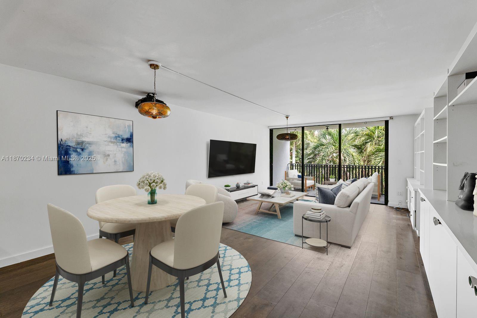 Completely Remodeled 2BD/2BA with split floor plan and serene views of Ocean Lane Dr. Features hardwood and tile flooring, impact windows, and stylish finishes throughout. Located in a pet-friendly, open-air building with private beach access just steps away. Includes 1 covered parking space plus ample guest parking.