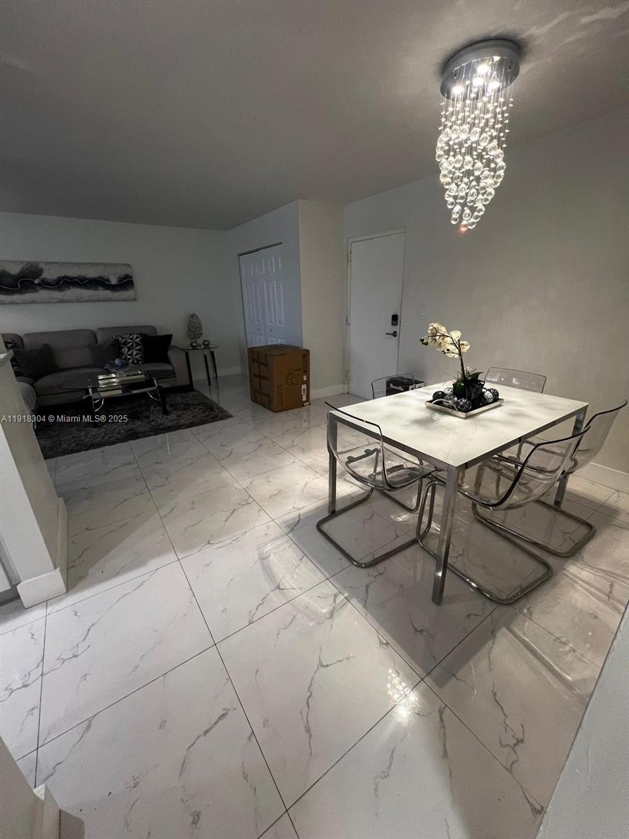 VERSIALLES GARDENS II CON - Residential Lease