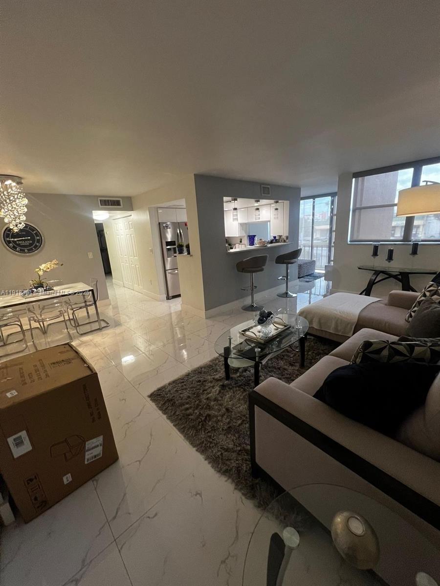 VERSIALLES GARDENS II CON - Residential Lease