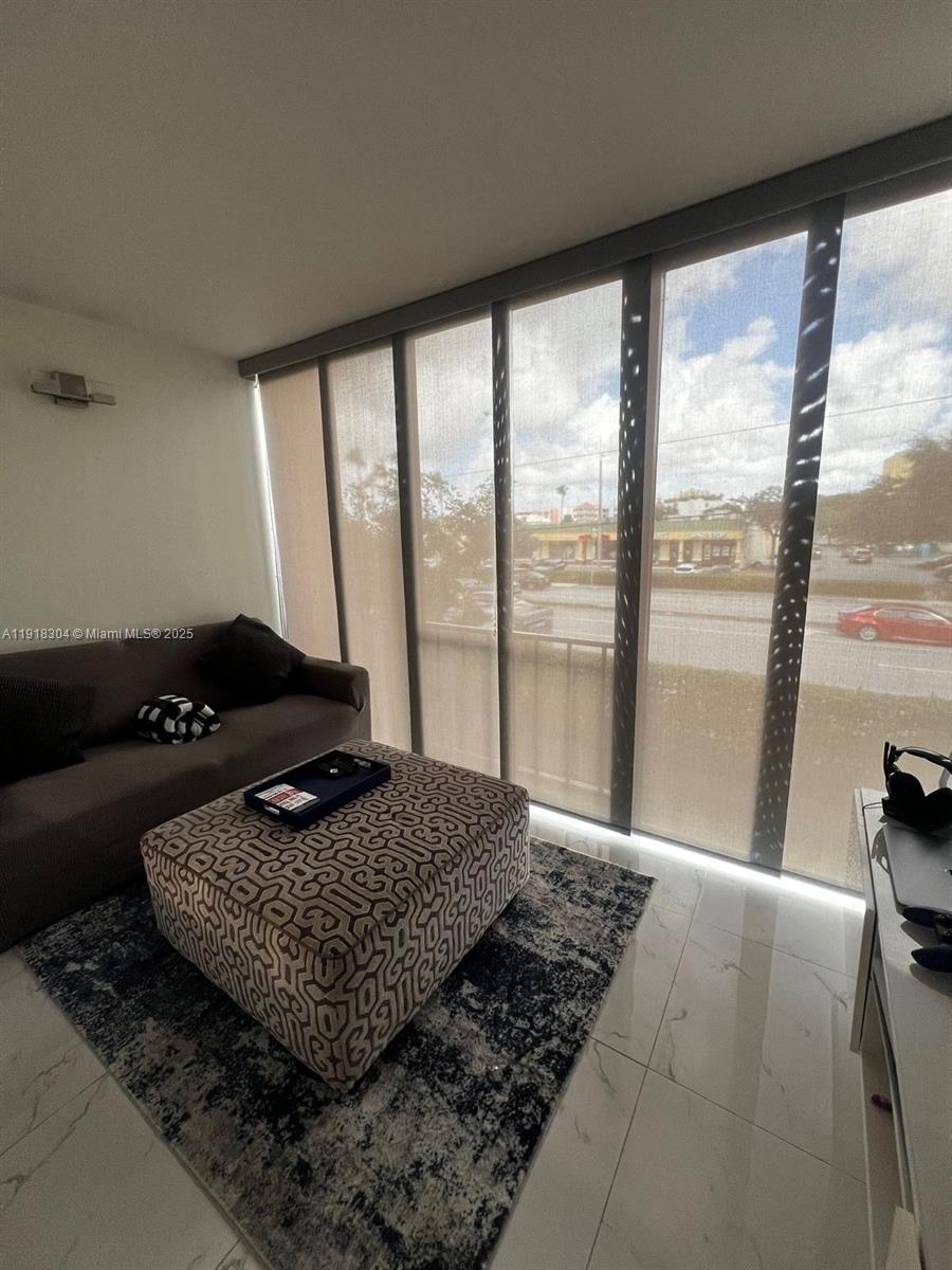 VERSIALLES GARDENS II CON - Residential Lease