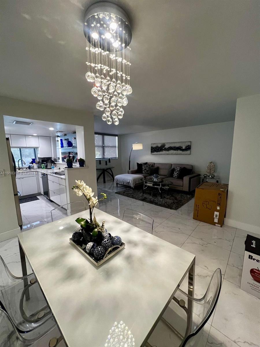 VERSIALLES GARDENS II CON - Residential Lease