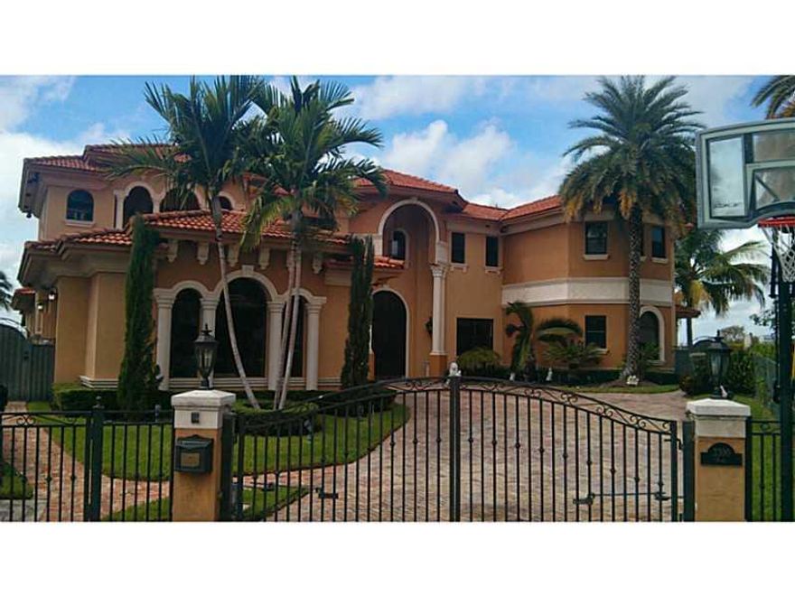 Stunning Eastern Shores 7br/8.5ba on 180ft wide water point lot w/MUST SEE sunset views. 60' dock on protected canal side. Library/office, exercise loft, billiard room, bar, maid's rm, 2nd laundry upstairs, chef's kitchen, wraparound patios, balconies & water views everywhere. Exquisite master w/bar & private balcony. Fabulous finishes, rock solid all-concrete construction, hurricane-proof glass & whole-house generator.  Best buy on modern home in guard-gated ES at $530/ft. See attachment for floor plans.