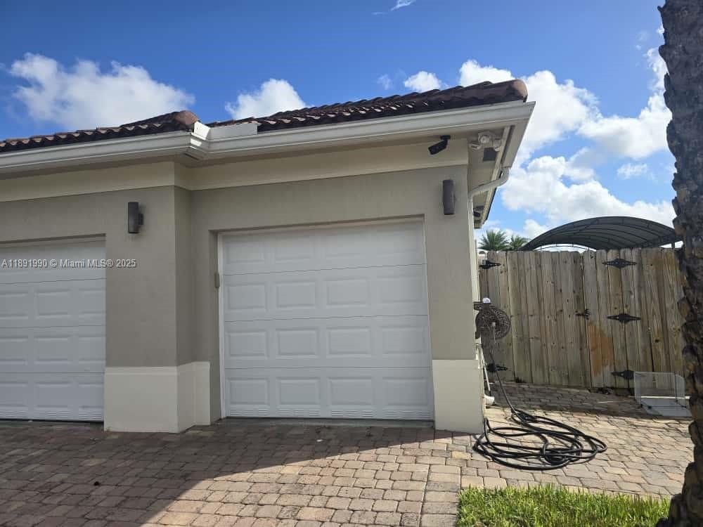Renovated, large, and very private 1/1 efficiency in a quiet, well-kept neighborhood. Rent includes electricity and water. Features a spacious gated and paved patio area and one assigned parking space. Kitchenette includes a refrigerator and plenty of cabinet and counter space (no range). Owner prefers a single, full-time working tenant. Pets are welcome. DO NOT DISTURB THE TENANTS IN THE MAIN HOUSE. BY APPOINTMENT ONLY.