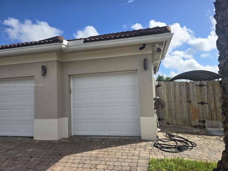 Renovated, large, and very private 1/1 efficiency in a quiet, well-kept neighborhood. Rent includes electricity and water. Features a spacious gated and paved patio area and one assigned parking space. Kitchenette includes a refrigerator and plenty of cabinet and counter space (no range). Owner prefers a single, full-time working tenant. Pets are welcome. DO NOT DISTURB THE TENANTS IN THE MAIN HOUSE. BY APPOINTMENT ONLY.