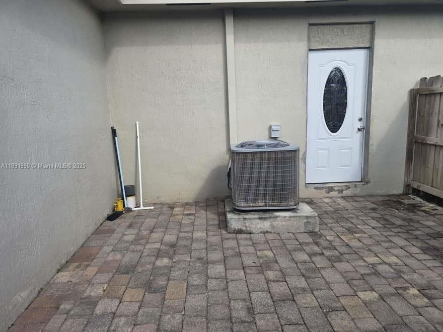 Renovated, large, and very private 1/1 efficiency in a quiet, well-kept neighborhood. Rent includes electricity and water. Features a spacious gated and paved patio area and one assigned parking space. Kitchenette includes a refrigerator and plenty of cabinet and counter space (no range). Owner prefers a single, full-time working tenant. Pets are welcome. DO NOT DISTURB THE TENANTS IN THE MAIN HOUSE. BY APPOINTMENT ONLY.
