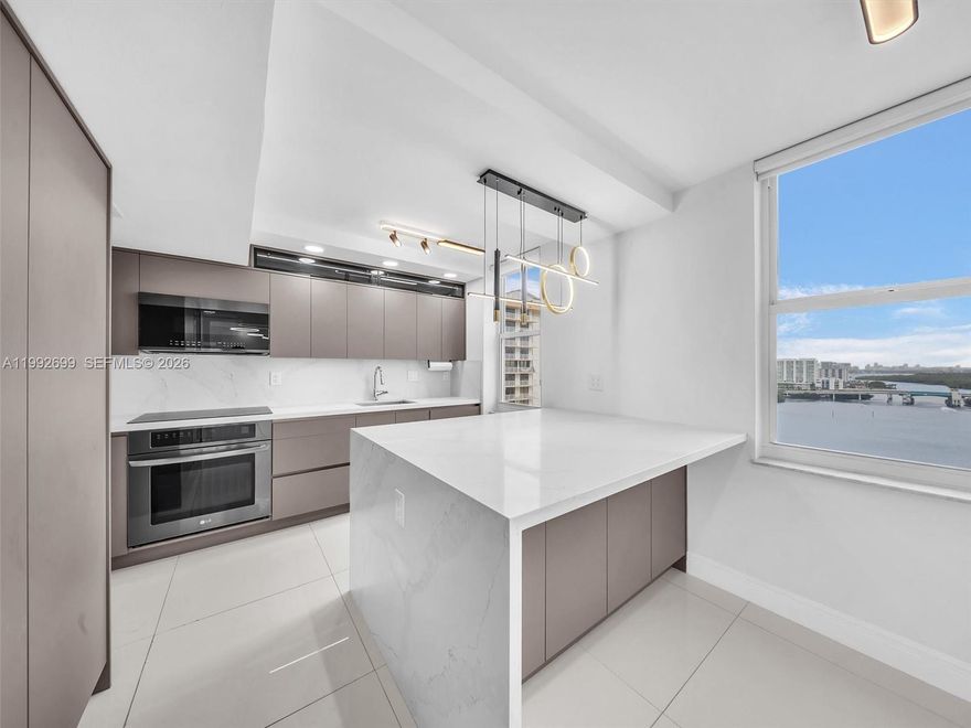 Beautifully upgraded and spacious corner residence in the heart of Sunny Isles Beach with breathtaking Intracoastal and ocean views. This oversized 2-bedroom, 2-bath unit offers a bright open layout and has been tastefully renovated throughout with a modern kitchen, elegant designer finishes, custom details, upgraded lighting, and beautifully finished walls. The home features marble floors, generous living spaces, abundant natural light, and a large balcony perfect for enjoying the water views. Located in Winston Towers, just minutes from the beach, shopping, dining, parks, and houses of worship. A move-in ready opportunity in one of Sunny Isles Beach’s most desirable locations. 2 parking spots and 2 storage spaces . No rentals allowed.