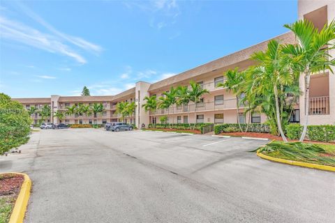 Photo of 10304 Sunrise Lakes Blvd #209, Sunrise, FL 33322 (MLS # A11833761)