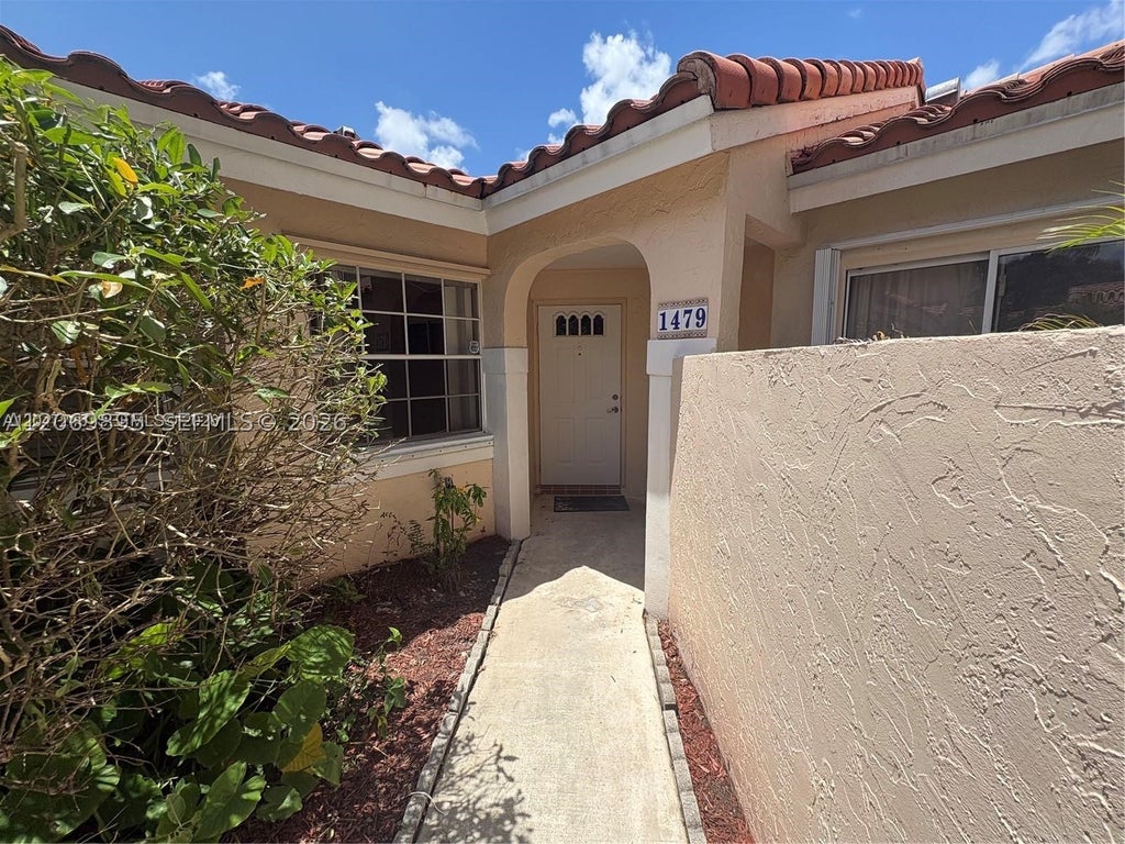 Photo of 1479 Springside Dr #1479, Weston, FL 33326 (MLS # A12069895)