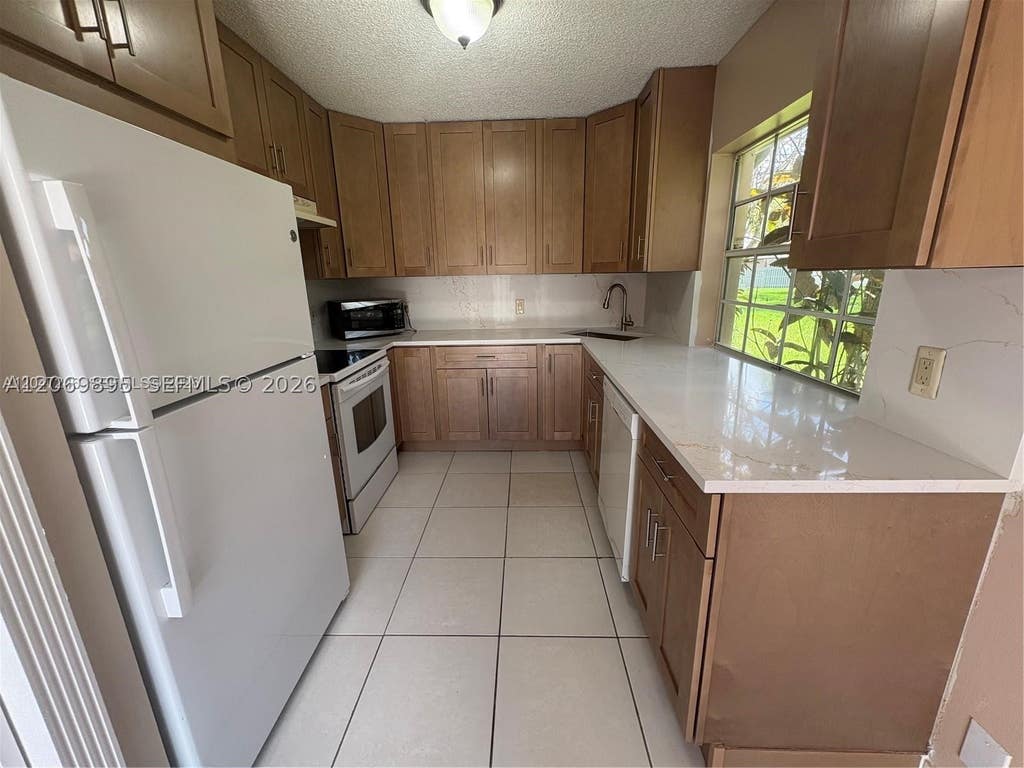 Photo of 1479 Springside Dr #1479, Weston, FL 33326 (MLS # A12069895)