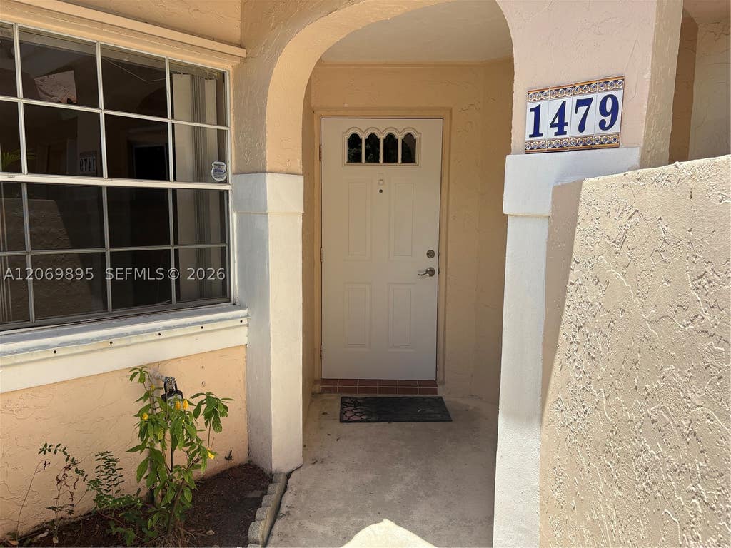 Photo of 1479 Springside Dr #1479, Weston, FL 33326 (MLS # A12069895)