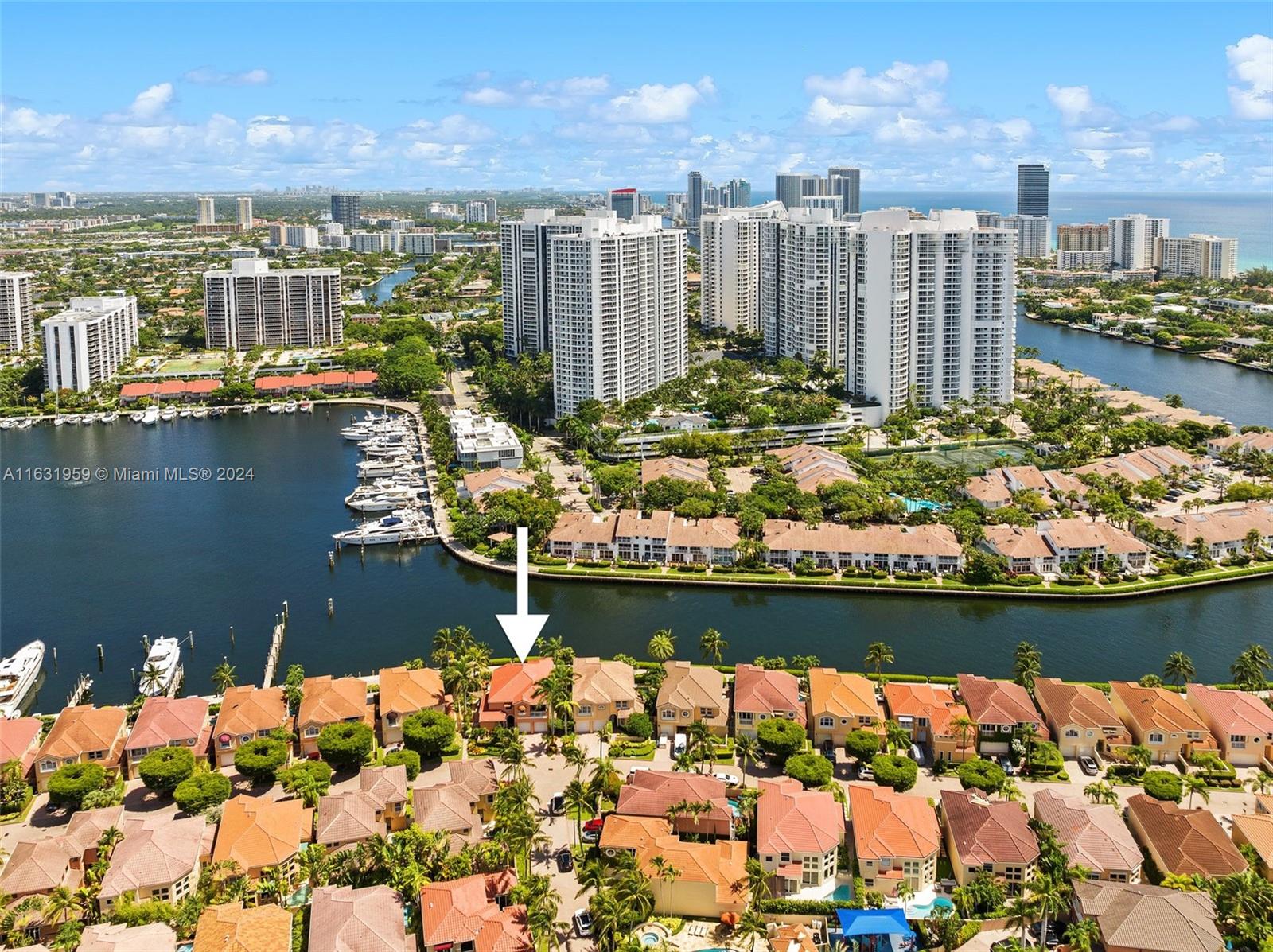 PSST! DON'T WAIT! ONLY HOME AVAILABLE IN PRESTIGIOUS GUARD GATED ISLAND WAY & IT'S ON THE WATER! WATERWAYS MARINA, WITH QUICK INTRACOASTAL AND OCEAN ACCESS, IS A BOATER'S DREAM! FROM THE BACKYARD, ENJOY THE WATERFRONT PROMENADE LEADING TO SHOPS & RESTAURANTS. PLUS, THE BACKYARD OFFERS PICTURESQUE PRIVACY FOR PEACE & TRANQUILITY--JUST ONE REASON LIVING IN THIS SECLUDED COMMUNITY OF ONLY 84 ELEGANT HOMES IS A PARADISE. HOME BOASTS MARBLE & WOOD FLOORS, FORMAL LIV/DIN RM W/TONS OF NATURAL LIGHT, UPDATED KITCHEN, WARM & COMFORTABLE FAMILY RM, BREAKFAST NOOK W/FULL BAY WINDOW BRINGING OUTDOORS IN, 1 BED/BATH DOWNSTAIRS, PRIMARY IS A SUITE RETREAT W/SIZABLE SITTING AREA, 3RD BD W/FULL PRIVATE BATH, HOME IS AN ENTERTAINERS DELIGHT! ROOF 2023, NEW AC, IMPACT WINDOWS, COMMUNITY BOAT DOCKS & MORE!