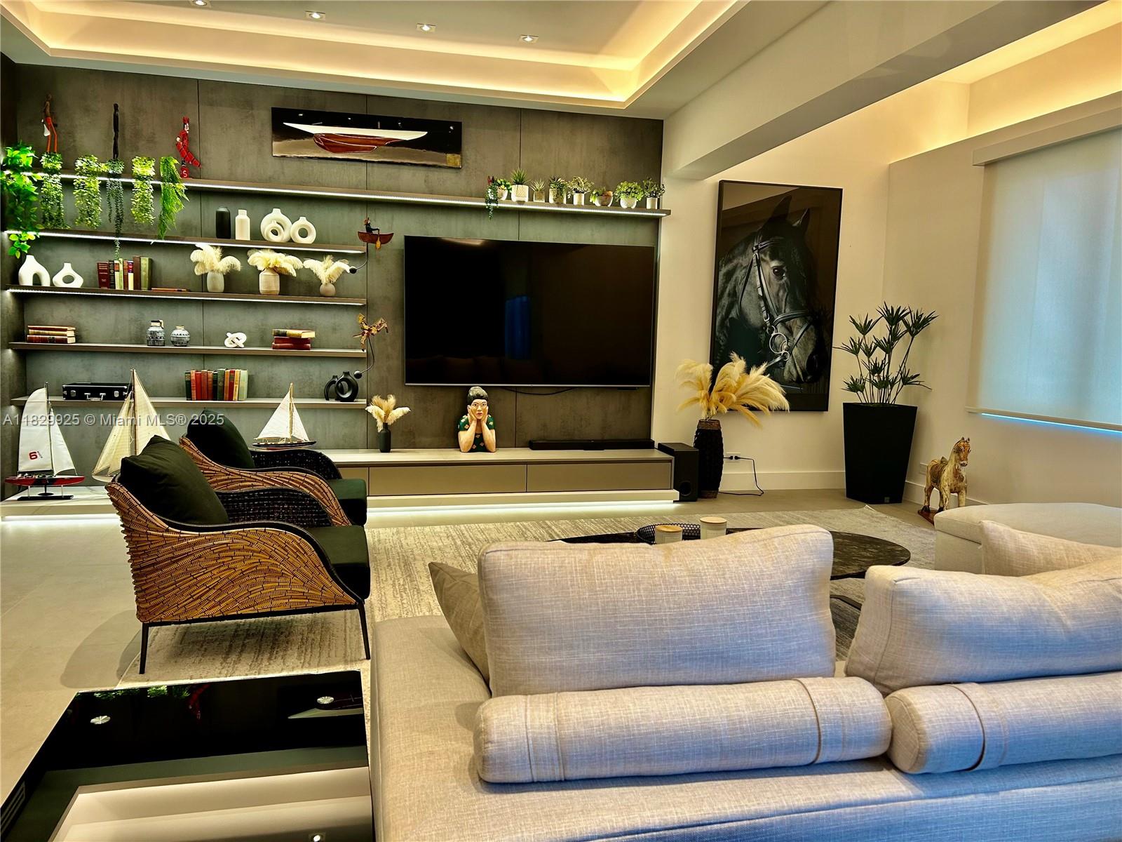 Located within the iconic 1 Hotel at Roney Palace, this exquisitely remodeled residence redefines luxury living in South Beach. Spanning 1,640 square feet, the expansive, fully furnished layout is thoughtfully designed and curated to perfection. High-end finishes abound, including a state-of-the-art Boffi kitchen and elegant furnishings by Artefacto.
The residence offers two spacious bedrooms with king-size beds and two sleek bathrooms. Additional features include in-unit laundry and two valet parking spaces for added convenience.
Enjoy exclusive access to 1 Hotel’s five-star amenities: resort-style pools, a world-class spa, fitness center, rooftop dining, and private beach service—luxury and comfort in the heart of South Beach.