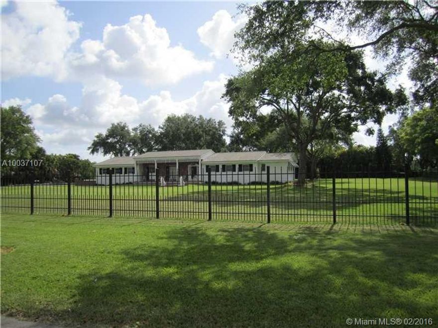 Stunning traditional home on a beautiful street in the Redlands. Home is surrounded by avocado grove for plenty of privacy. Large kitchen opens up to the family room. Oversized master bedroom with his/her closets. Stunning original hardwood floors throughout. Wood burning fireplace and brick terrace. Yard is canopied by huge oak trees. 2 car garage and 6+ car outbuilding.  NOT SUBJECT TO APPRAISAL