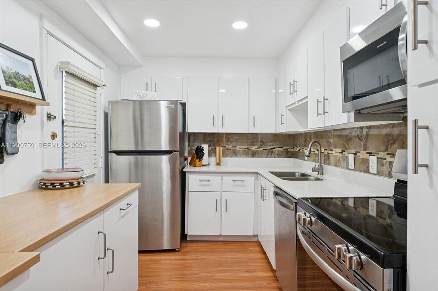 Prime location in the heart of Aventura. Don’t miss this beautifully updated 2-bedroom, 2-bathroom corner unit in the Bravura community. This bright first-floor condo features a spacious open layout filled with natural light and a rare wraparound balcony with serene garden views, perfect for relaxing or entertaining. Enjoy generous living areas, abundant closet space, and tasteful upgrades throughout, making it completely move-in ready. Just steps from the renowned 3.5-mile Country Club Circle, ideal for walking, jogging, and biking. Amenities include a pool, fitness center, BBQ area, bike storage, and laundry facilities. Maintenance covers cable, internet, water, sewer, and trash. Major value: SPECIAL ASSESSMENT has been PAID IN FULL by the owner. Ideally located minutes from Aventura Mall, top dining, beaches, houses of worship, and major highways. Quiet, well-maintained building with assigned parking. Seller is relocating and priced to sell, creating an excellent opportunity for buyers seeking value in Aventura. Schedule your showing today and bring your offers.