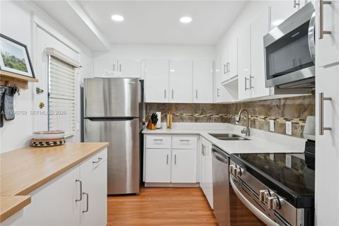 Photo of 3101 N Country Club Dr #102, Aventura, FL 33180 (MLS # A11990759)