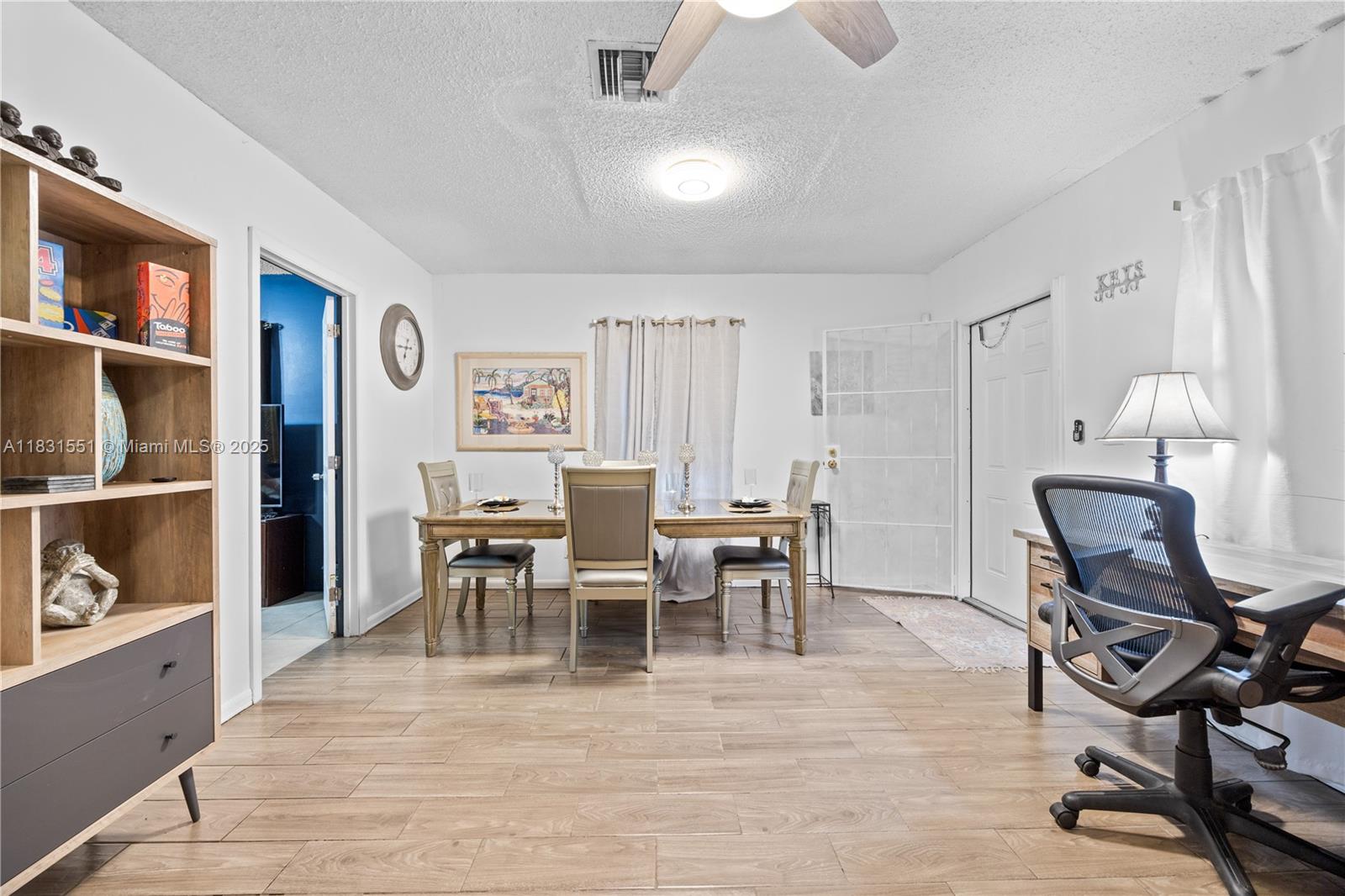 Fully furnished 3-bedroom, 1-bathroom back unit in a centrally located Miami duplex with its own fenced driveway for private parking and exclusive backyard access. Enjoy a separate entrance, spacious layout, and turnkey setup just move in and start living. Located just off I-95, this property offers quick access to Wynwood, Downtown, the Design District, and Miami Shores.