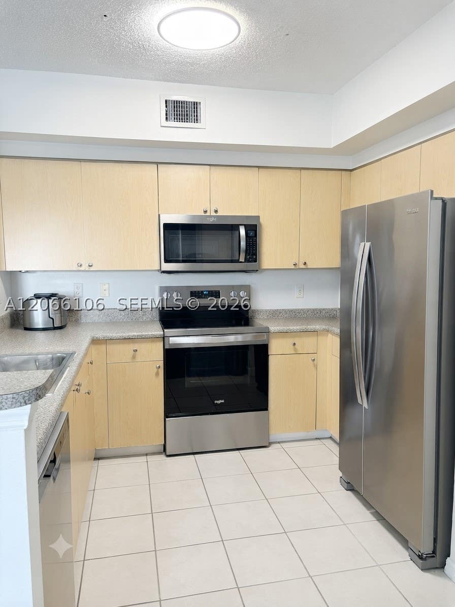 Photo of 2200 E Preserve Way #306, Miramar, FL 33025 (MLS # A12066106)