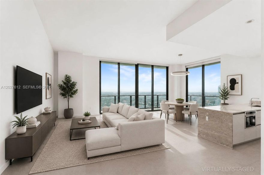 Elegant Urban Retreat: Experience elevated living in this 3-bedroom, 2.5-bathroom corner penthouse at SLS Brickell, featuring soaring 12-foot ceilings and refined modern finishes. This residence offers an open-concept layout with quartz-appointed European kitchens and breakfast bars, generous walk-in closets, and in-unit laundry, all framed by stunning city and bay views. Residents enjoy access to premium amenities including two acclaimed fine-dining restaurants, a rooftop pool, a state-of-the-art fitness center, a luxurious spa, along with 24-hour security and valet services.