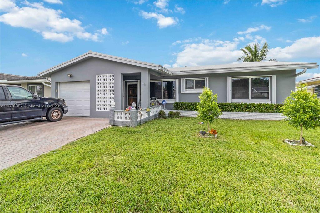 Photo of 4507 NW 44th St, Tamarac, FL 33319 (MLS # A11876087)