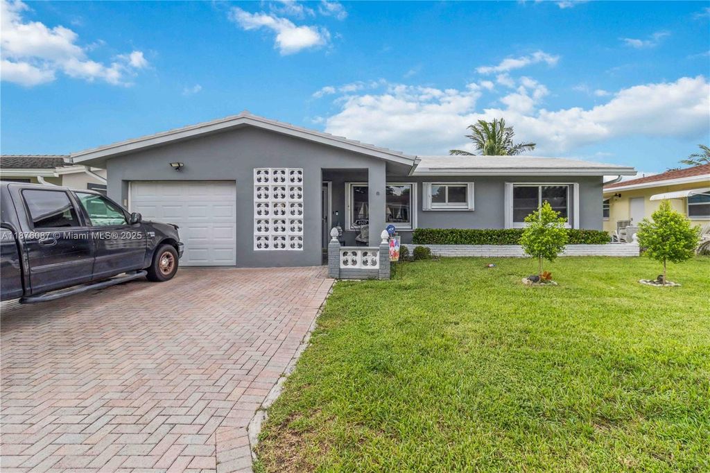 Photo of 4507 NW 44th St, Tamarac, FL 33319 (MLS # A11876087)