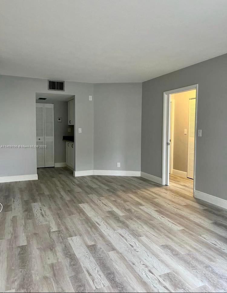 Photo of 105 Gardens Dr #104, Pompano Beach, FL 33069 (MLS # A11459106)