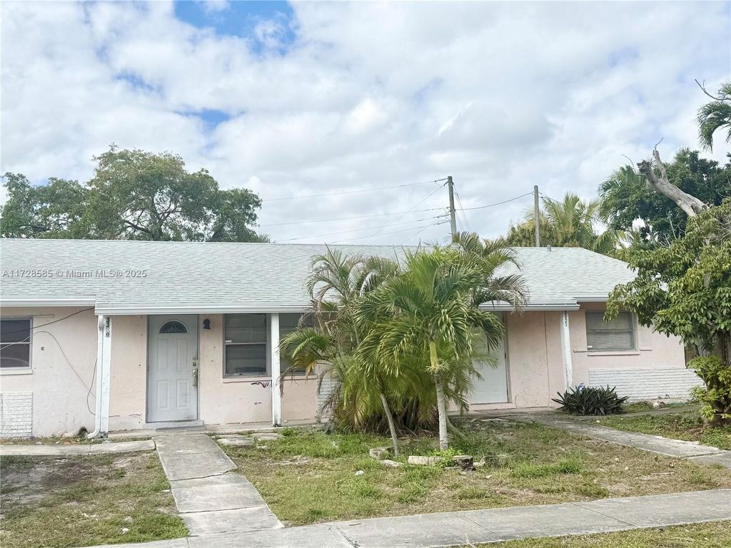 Photo of 3319-3321 Grove Rd, Boynton Beach, FL 33435 (MLS # A11728585)