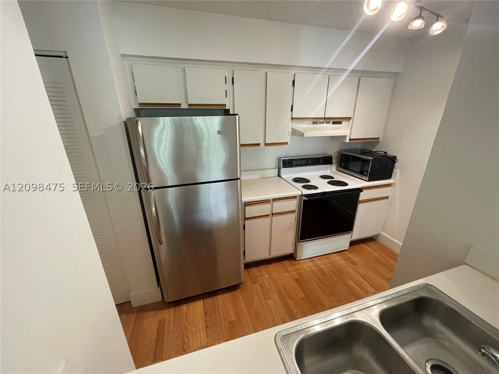 Photo of 520 S Park Rd #24-12, Hollywood, FL 33021 (MLS # A12098475)