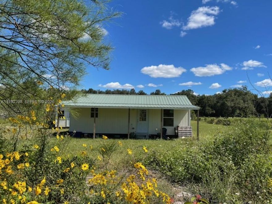 *****  5 BEAUTIFUL ACRES in FLORIDA  ******
In the middle of Archer, Newberry, and
Gainesville, FL

1BEDROOM/1BATH TINY HOME CONSTRUCTION  BUILT 2023 and STORAGE SHED!
Laminate Pine Wood Floors, Central Air/Heat. New Front and Back Porch, New Septic tank 
and drain field. New Electrical to Tiny Home.  Ready for you to move in!!
OR Build your Dream Home!
Mini-Farm/AGRICULTURE/ANIMALS/HORSES/FARMING, many possibilities!

ALSO, an Older mobile/manufactured 3/2 home (1,152 Sq ft) is on the property, which can be used for storage or
repaired/fixed to live in.  

CALL TODAY!  OWNER MOTIVATED!!