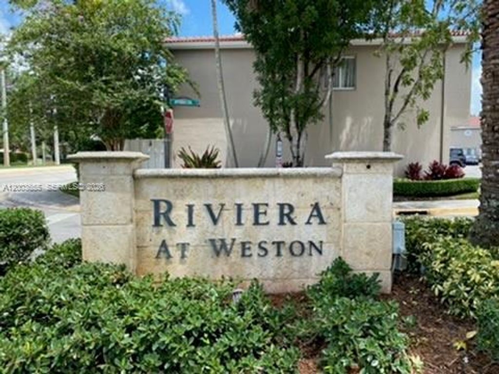 Photo of 203 Riviera Cir #203, Weston, FL 33326 (MLS # A12003655)