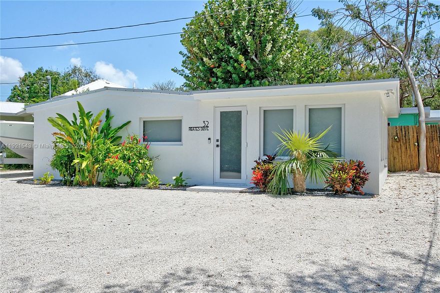 Sweet and Sleek in the Keys! Beautifully remodeled 2-bedroom, 1-bath conch-style home. Expertly designed with a smart, efficient layout where every detail has its place—much like the tidy elegance of a well-kept ship. Light-filled and airy. Friendly, family neighborhood, where kids ride bikes, neighbors wave, and the laid-back Keys lifestyle thrives. Enjoy access to a boat ramp a few homes away, a delightful little beach, and a clubhouse where school pickup adds peace of mind for families. Whether you're looking for a cozy getaway or a full-time island nest, this charming cottage is the perfect blend of tropical ease and efficient elegance. Move-in-ready retreat. Whether you're looking for a full-time residence or a vacation escape, this home checks every box.