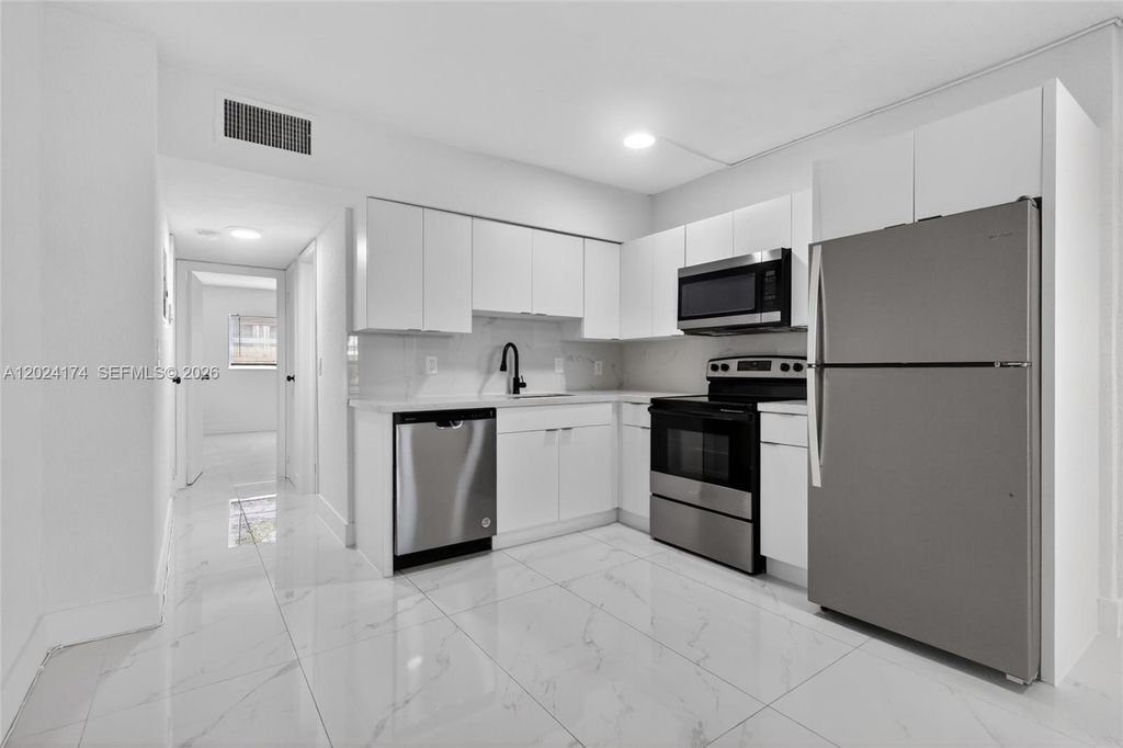 Photo of 1740 Funston St #4, Hollywood, FL 33020 (MLS # A12024174)