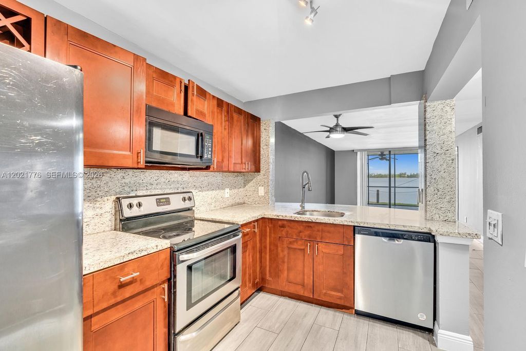 Photo of 109 Lake Emerald Dr #108, Oakland Park, FL 33309 (MLS # A12021776)