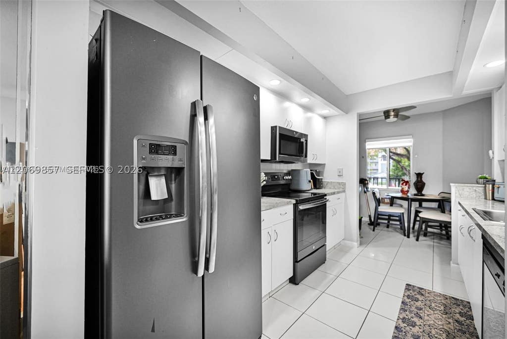 Photo of 12750 SW 15th St #204D, Pembroke Pines, FL 33027 (MLS # A12069857)