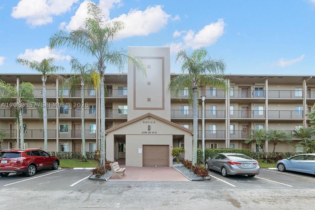Photo of 12750 SW 15th St #204D, Pembroke Pines, FL 33027 (MLS # A12069857)