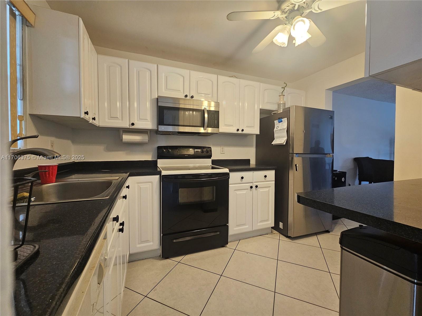 Property for Sale at 661 N University Dr 1-102, Pembroke Pines, Miami-Dade County, Florida - Bedrooms: 2 
Bathrooms: 2  - $259,900