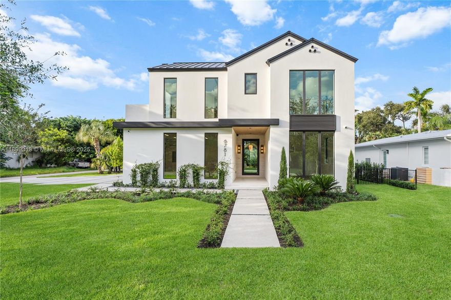 Spectacular new construction in the heart of South Miami! This Modern-Farmhouse offers the perfect blend of contemporary design and refined luxury, ideally located just minutes from downtown SOMI, Coral Gables, Pinecrest, and major highways. Featuring 5 spacious bedrooms (four upstairs) and 6.5 baths, the home boasts a sleek open layout with seamless indoor-outdoor living. Exquisite marble and porcelain finishes complement a MiaCucina kitchen, oversized butler’s pantry with wine storage, summer kitchen, cabana bath, and sliding glass doors opening to a private, lush backyard. The primary suite includes a private terrace, spa-inspired bath, and oversized walk-in closet. Set on a beautifully landscaped lot near top private schools, this home defines sophisticated South Miami living.