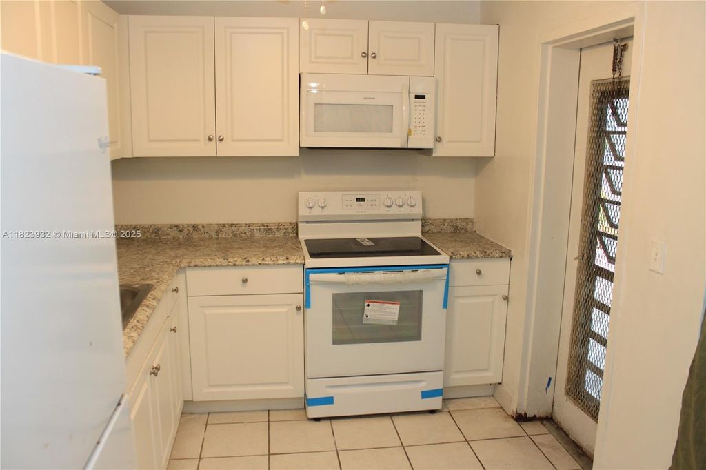 Photo of 4090 NW 42nd Ave #106, Lauderdale Lakes, FL 33319 (MLS # A11823932)