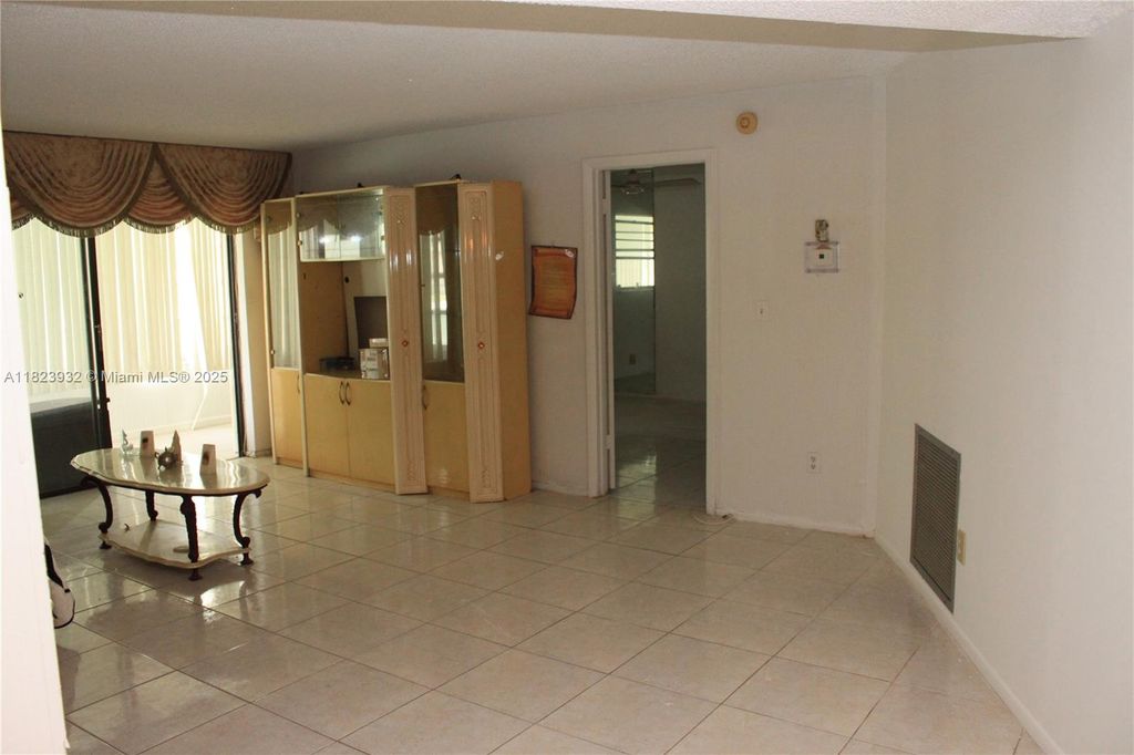 Photo of 4090 NW 42nd Ave #106, Lauderdale Lakes, FL 33319 (MLS # A11823932)