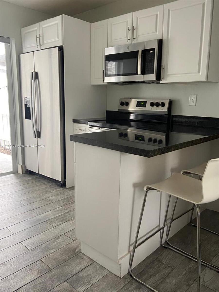 IMAGES OF KENDALL CONDO - Residential Lease