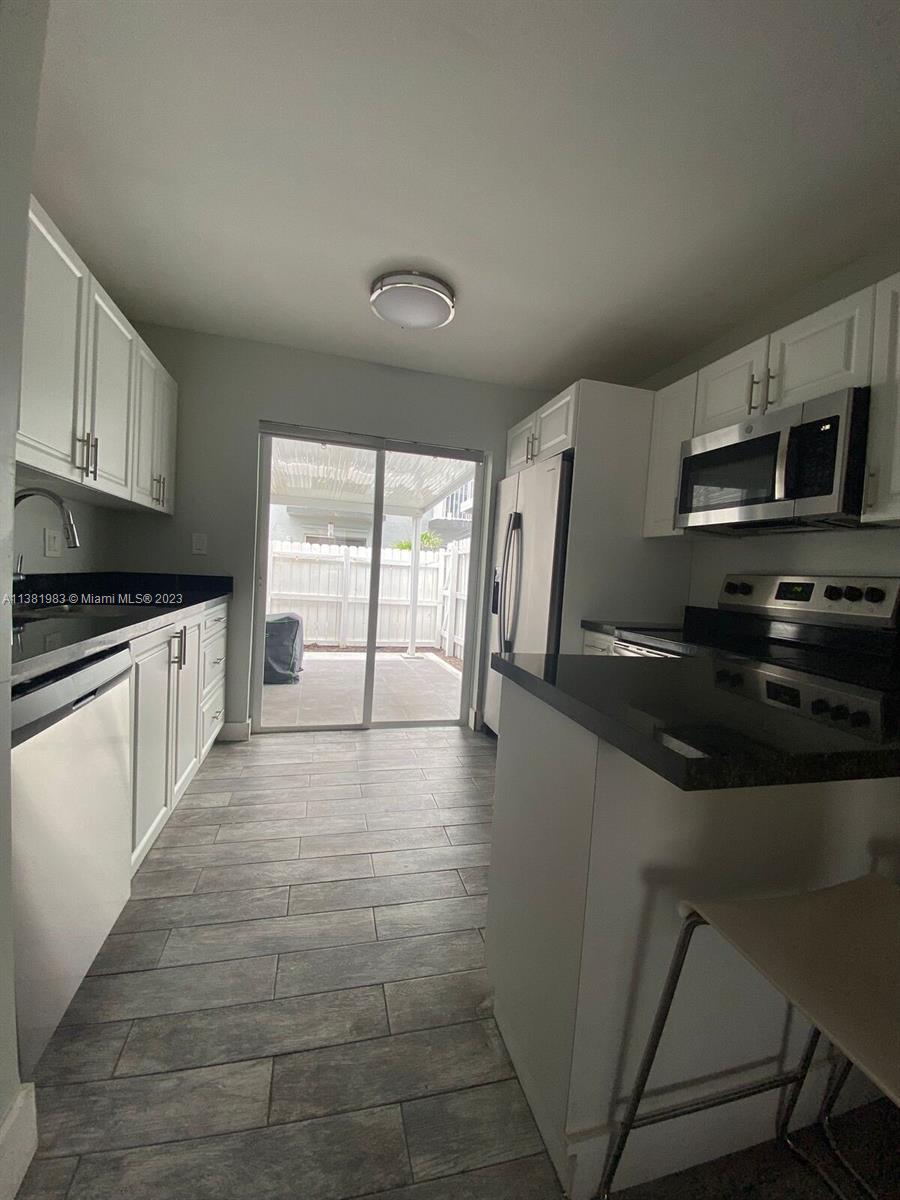 IMAGES OF KENDALL CONDO - Residential Lease