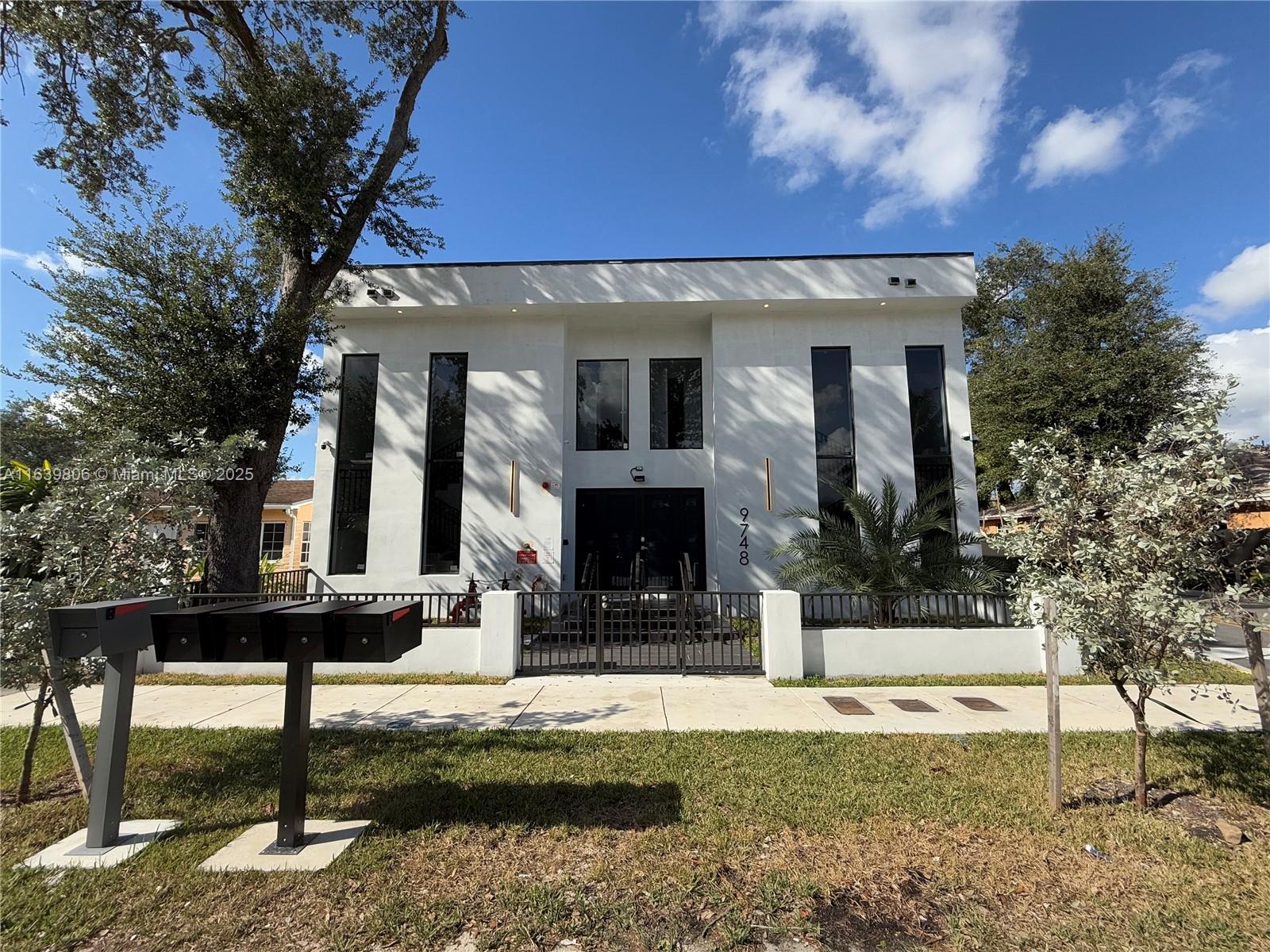 BRAND NEW Luxury Modern Building. Appraised at 2.260M. 15% down lender approved. FULLY RENTED. Must see this one of a kind building! Almost $14,000 total monthly income. A rare commodity in South Florida. Two stories with nice modern railings in lobby. Two units of 2/2 and two of 1/2.. New parking lot with EV space. Fire sprinklers installed with fire protection measures for greater insurance discount. Building has four studios. Porcelain floors throughout with a luxurious look and high ceilingsImpact windows and doors. SMART door locks with fire rated doors. Property has a high performance septic system. CCTV system. Opportunity zone!