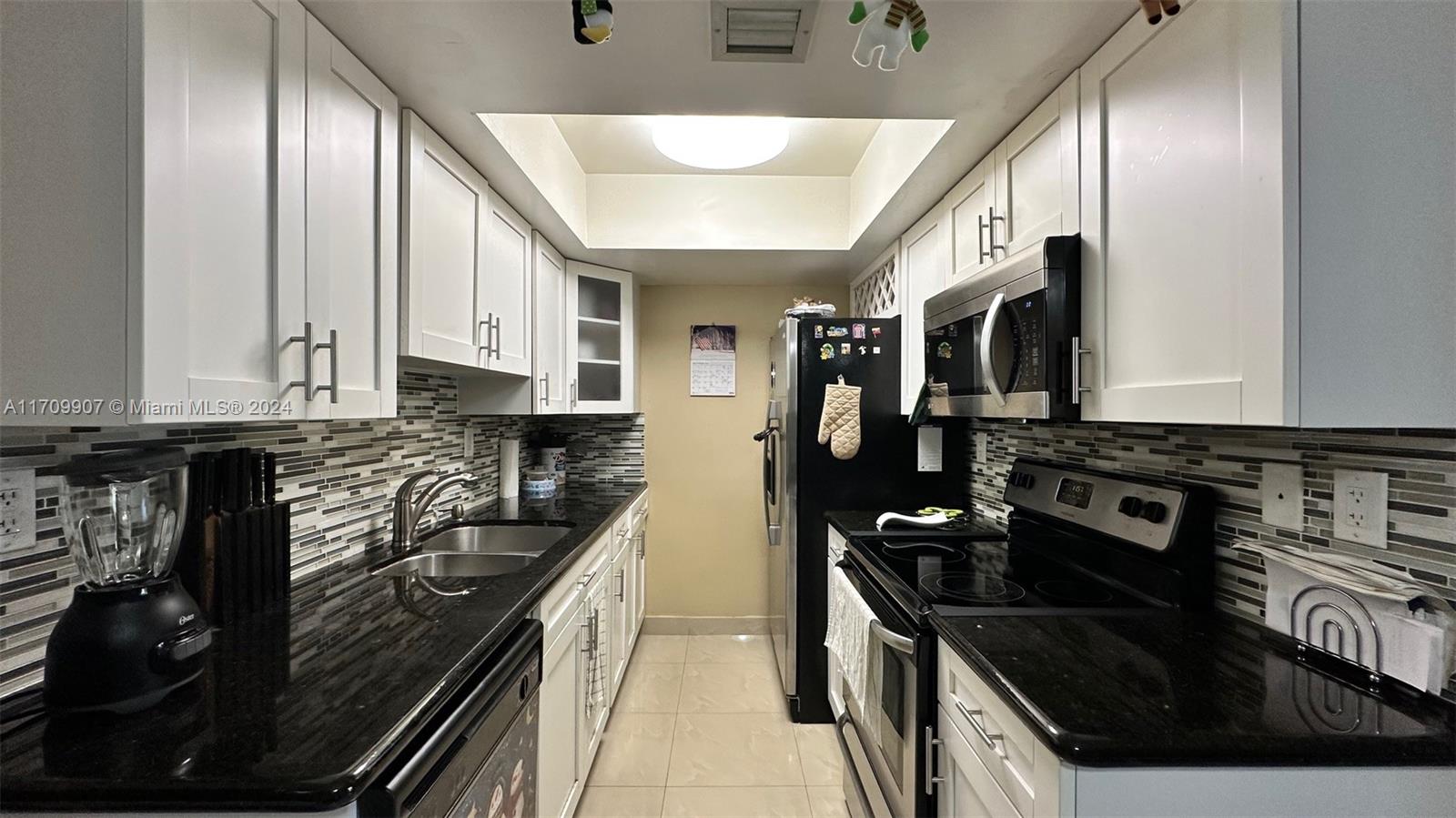 Spectacular Condo-Style Villa Apartment in a Prime Location! This gem features 3 spacious bedrooms and 2 bathrooms, perfect for investors or families. Enjoy a private balcony overlooking the street and the convenience of an in-unit washer and dryer. The kitchen boasts black granite countertops and modern white cabinets, combining style and functionality. The living-dining area is spacious, and the bedrooms include ample walk-in closets. Located in a quiet, highly sought-after area near the Turnpike, this apartment offers easy access to the city, with restaurants, shops, and supermarkets nearby. Just 30 minutes from Miami International Airport and 40 minutes from Miami Beach. Don’t miss this incredible opportunity—schedule your visit today!