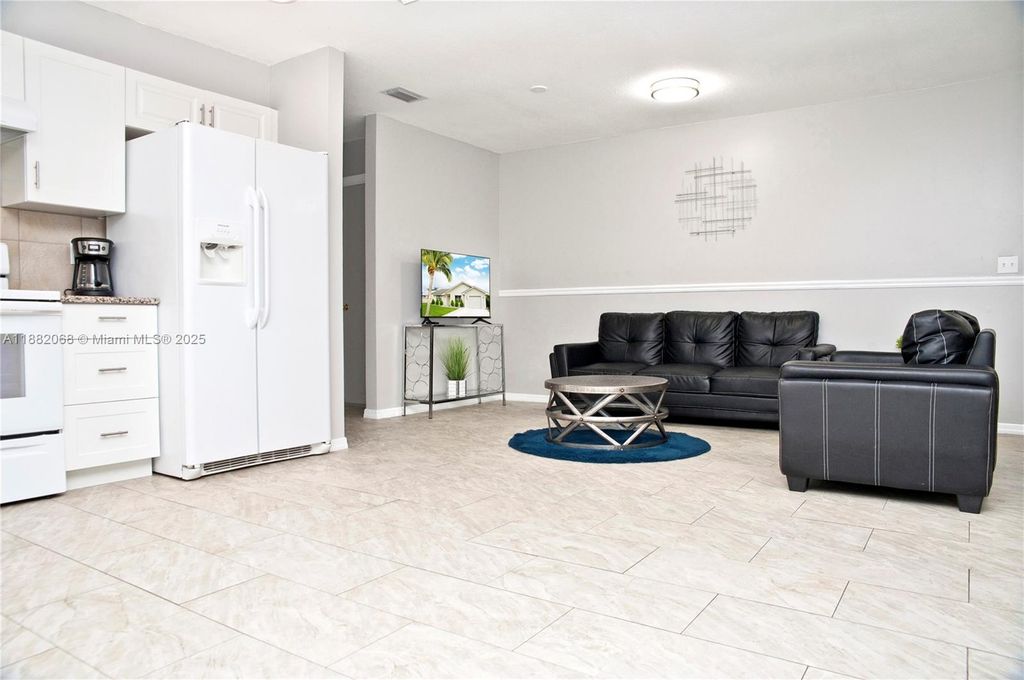 Photo of 722 SE Thanksgiving Ave, Port St Lucie, FL 34984 (MLS # A11882068)