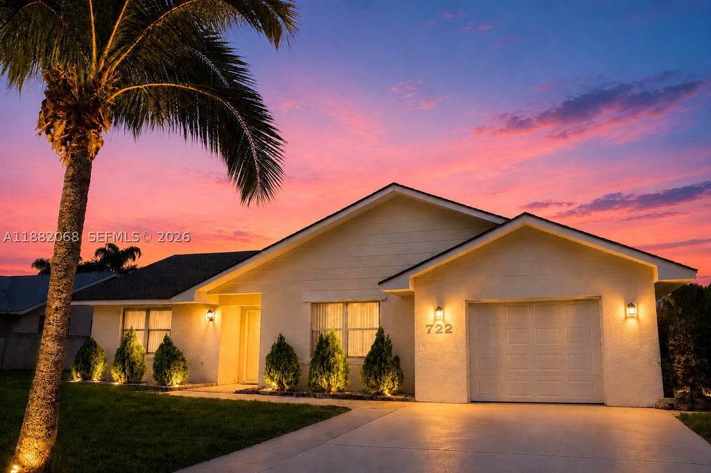 Photo of 722 SE Thanksgiving Ave, Port St Lucie, FL 34984 (MLS # A11882068)