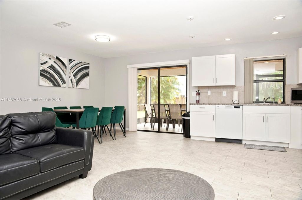 Photo of 722 SE Thanksgiving Ave, Port St Lucie, FL 34984 (MLS # A11882068)