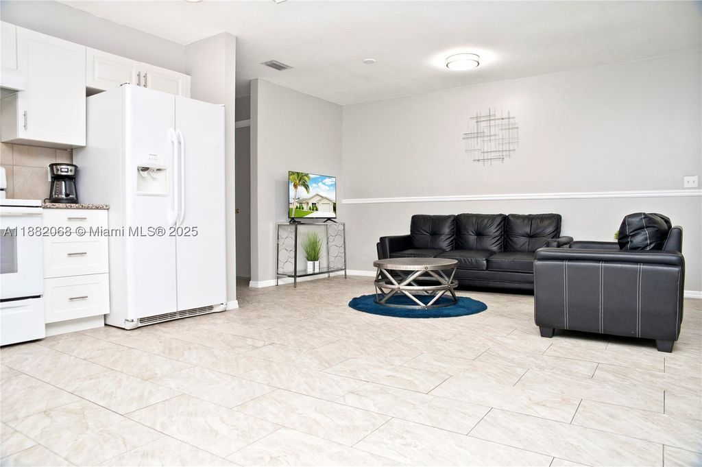 Photo of 722 SE Thanksgiving Ave, Port St Lucie, FL 34984 (MLS # A11882068)