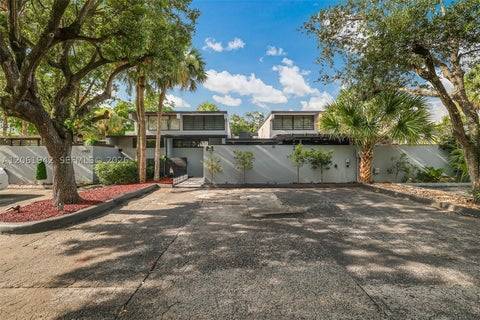 Photo of 6402 Windmill Gate Rd, Miami Lakes, FL 33014 (MLS # A12061942)