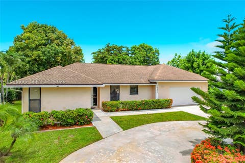 Photo of 14898 Fairwind Ln, Delray Beach, FL 33484 (MLS # A12046996)