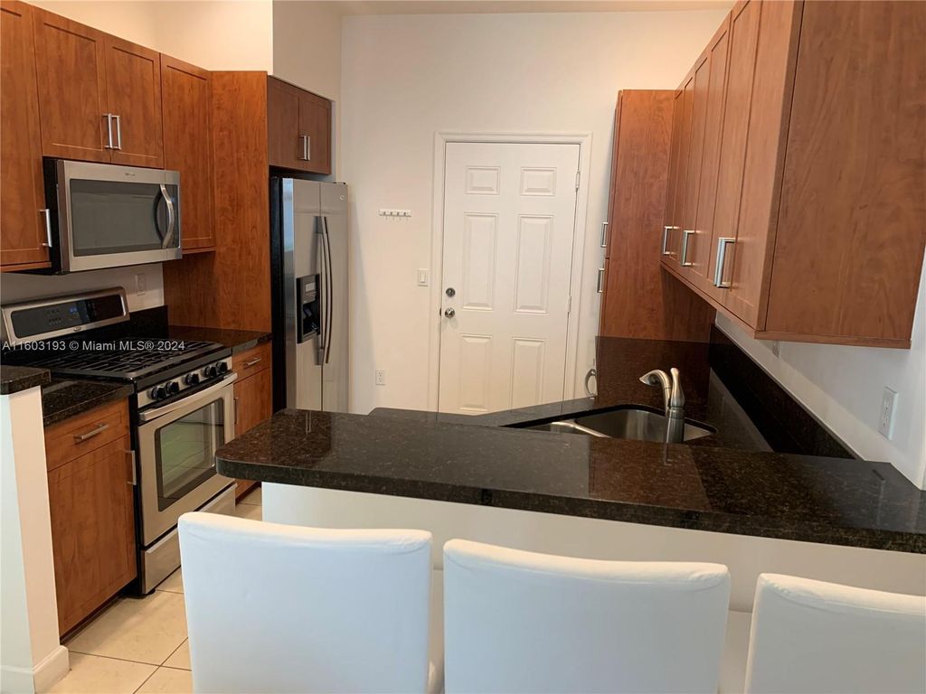 Photo of 12674 NW 32nd Pl #12674, Sunrise, FL 33323 (MLS # A11603193)